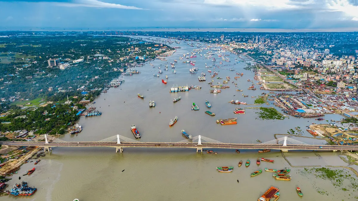 Aerial view of the Karnaphuli River in Chattogram with the Shah Amanat Bridge