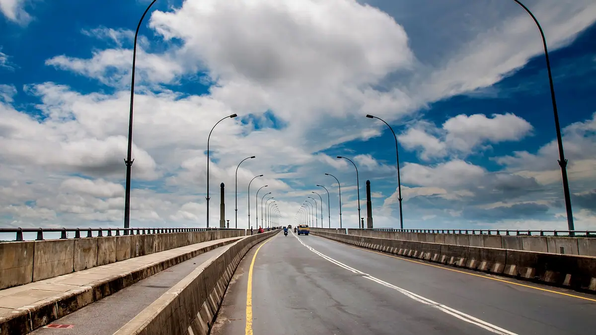 The road over the Rupsha Bridge in Khulna under a cloudy sky